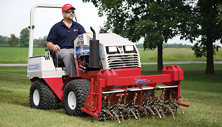 Ventrac 4500 compact tractor with aerator attachment