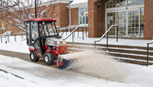 Ventrac 4500 compact tractor with rotating broom sweeper