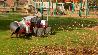 Ventrac tractor with turbine blower attachment