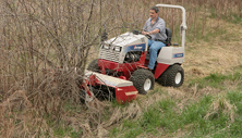 Ventrac rough cut mower takes down thick bushes. Click image for more detail