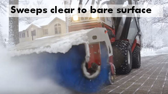 Ventrac HB580 rotating broom sweeping snow down to bare pavement