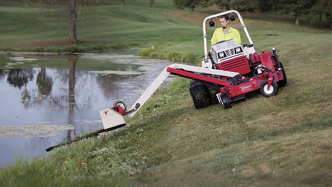 Maintain lake shores, ponds, and deep ditches with the Ventrac boom mower