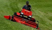 Steiner 235 compact tractor with side discharge mower