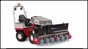 Ventrac 4500 series compact tractor with Aera-Vator and Seed Box attachments