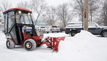 Ventrac 4500 with heated cab and hydraulic V-blade snow plow