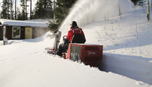 Ventrac 3400 tractor with snowblower clears deep snow. Click image to see specs on snow blower