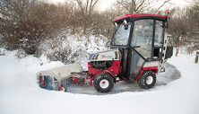 Ventrac 4500 with rotating broom. Click image to see Broom specs
