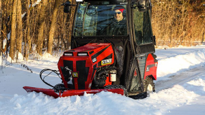 Steiner 450 Compact Tractor with Cab and V-blade